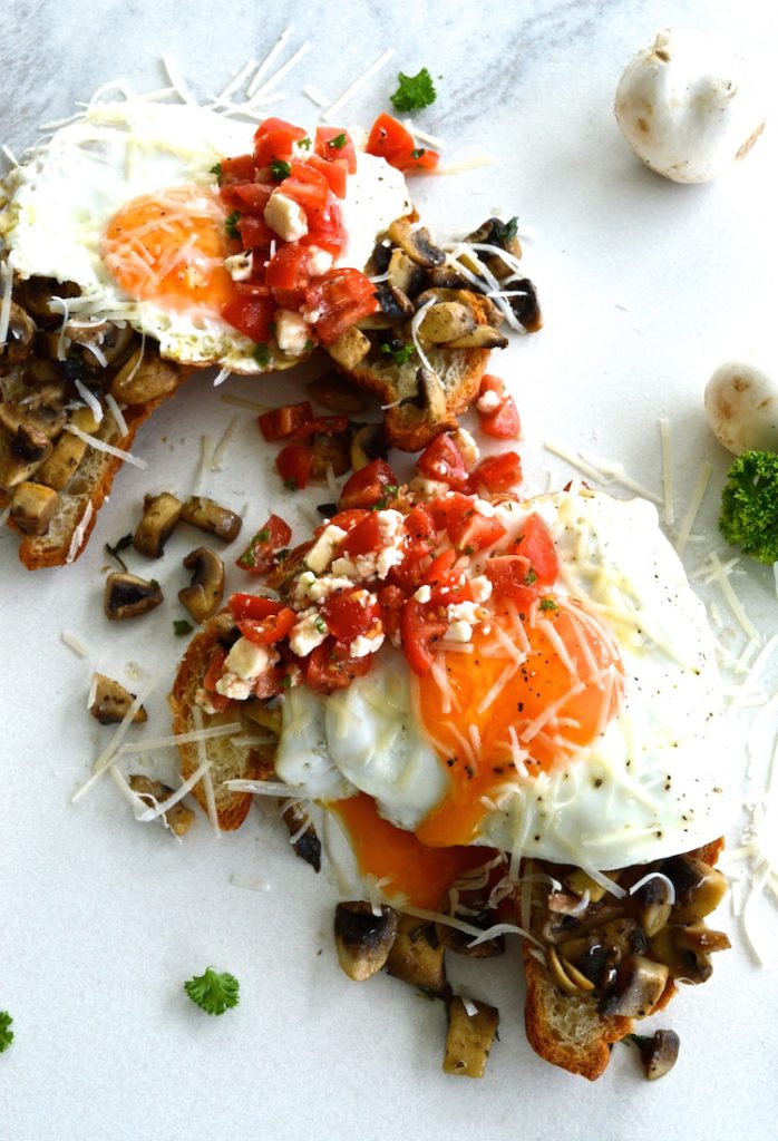 Open Faced Egg And Mushroom Croissant Sandwich With Tomato Feta Salsa